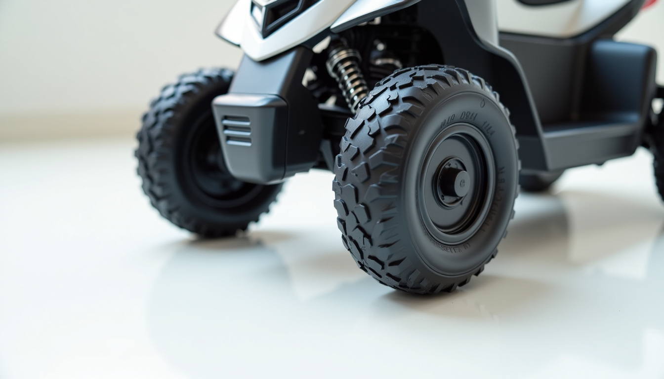 Détail du châssis et des roues d’un quad électrique pour enfant, mettant en évidence les matériaux utilisés